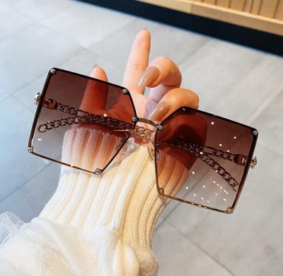 China Fashion sunglasses chain fashionable sunglasses UV protection sunglasses all-match large square cavity women's sunglasses 2022 for sale