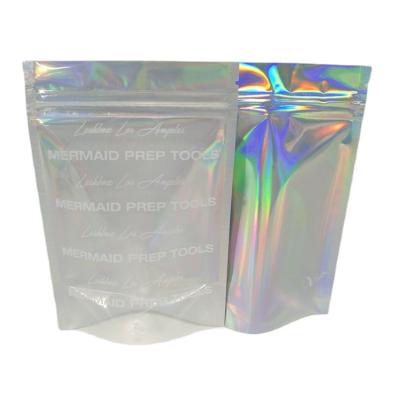 China Custom Hologram Moisture Proof Mylar Clear Logo Eyelashes Zip Lock Resealable Holographic Foil Stand Up Pouch For Cosmetics for sale