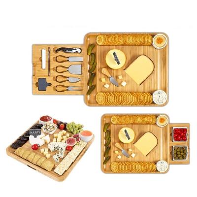 China Sustainable Square Cheese Plate Platter Tray Slide Out Drawers Bamboo Cheese Board With Knife Set for sale