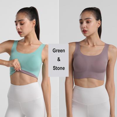 China Breathable New Design Super Comfortable Reversible Yoga Bra Gym Naked Feeling Sports Wear Bra Fitness Yoga Top Women's Wear Non-Trace Bra for sale