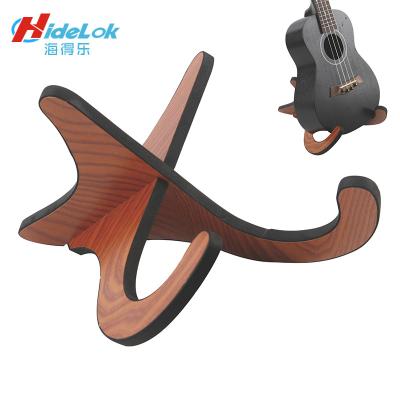 China Wooden Guitar Stand 21 23 26 Inch Ukulele Stand 1/6 Musical Instrument Stand Wooden Stand Wholesale Simple Modern Ukelele Small Foldable for sale