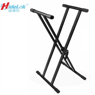 China Modern simple wholesale keyboard stand double-x size is adjustable with handle for sale