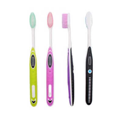 China Novelty Toothbrush OEM Color Tapered Bristle Handle Wide Adult Toothbrush Manufacturing for sale