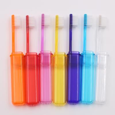 China Travel Collapsible Colorful Foldable Toothbrush with Brush Holder for sale