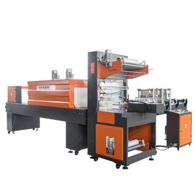 China Semi-automatic heat seal food shrink wrap tunnel shrink wrap wrapping machine for sale