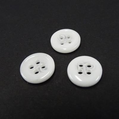 China E-8609 Sustainable Plastic Round Horn Bone Sewing 4 Holes Resin Buttons For Shirt for sale