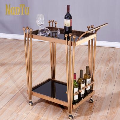 China Modern Kitchen Serving Trolley 2 Tier Trolley Cart Gold Metal Drinkware Bar Cart With Wine Rack for sale