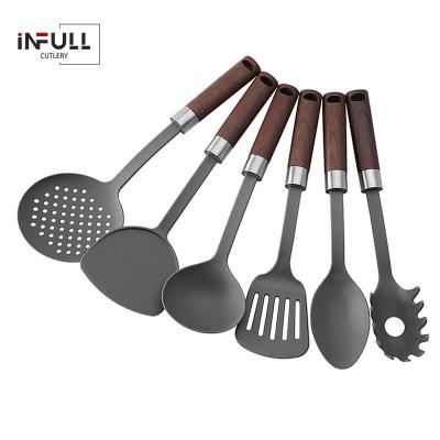 China Viable Nylon Kitchenware Kitchen Tools Non Stick Blackccc Turner Soup Ladle Spatula Shovel Baking Heat Resistant for sale