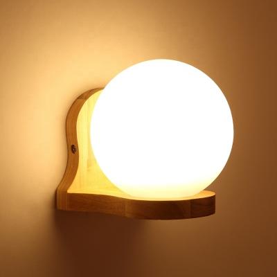 China Modern Wholesale Indoor Lighting Solid Wood Round Glass Modern Decorative Bedroom Living Room Corridor Aisle Wall Lamp Night Light for sale