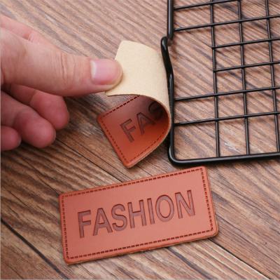 China Sustainable Custom Made Alloy Beef Leather Trademark Skin Embossed PU Leather Patch for sale