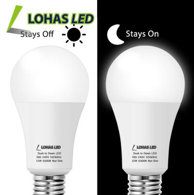 China Residential Auto On/Off A19 Dusk To Dawn Sensor Light Bulb 12W Light Sensor LED Bulb for sale