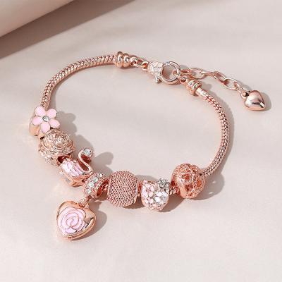 China Lead Free and Nickel Free Vintage Oil Drop Flower Charm Bracelet Rose Gold Rhinestone Crystal Flower Heart Charm Bracelet for sale