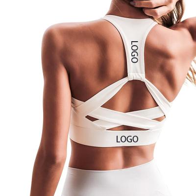 China 2021 Breathable new arrival sports bra soild color designer custom made cross back sports bras for women fitness for sale