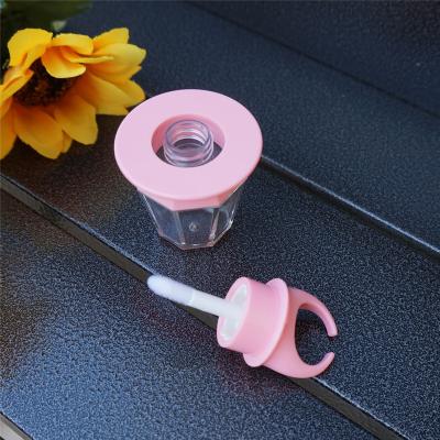 China Cosmetic Lip Gloss Packaging 8ml Polygon Ring Shape Refillable Pink Lip Gloss Tube Lip Balm Bottle Magic Wand Brush Container Empty Bottle for sale