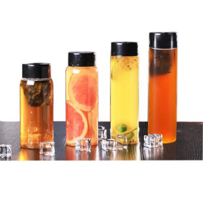 China Factory 480ML 550ML Factory Outlets Coffee Tea Smoothies Cylindrical Transparent Homemade Drinks Milk Plastic Bottle With Black Lid for sale