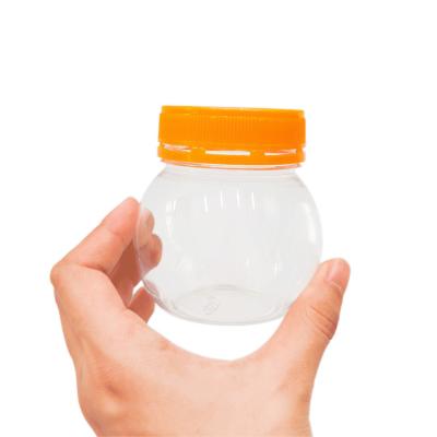 China 210ML Factory Direct Sale Eco-friendly PET Bottle Small Spherical Plastic Ball Jars Clear Jars With Lids Mason for sale