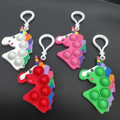 China Stress Reduce Silicone Pendant New Cartoon Key Chain Beads Wiggle To Unzip Pendant Toy Finger Bubble Toy Push With Hook for sale