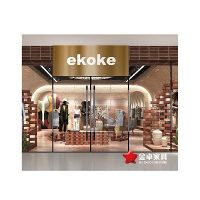 China Women Clothing Store Interior Design MDF Garment Showcase Cabinet And Clothing Display Rack Customized for sale