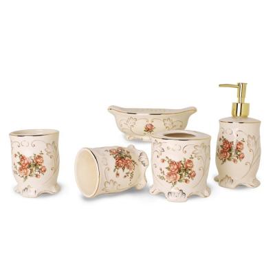 China 5/4pcs Viable Custom High Quality Countertop Accessories White Ceramic Flower China Bathroom Accessories Set Toiletries for sale