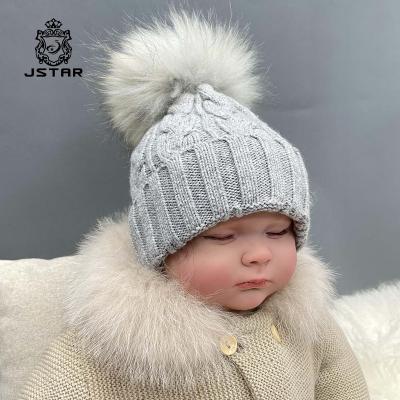 China High Quality COMMON COMMON Beanie Hat Unisex Cashmere Knitted Winter Warm Kids Hat With Raccoon Fur Ball for sale