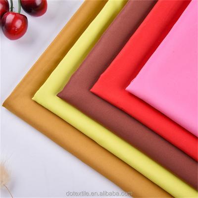 China Environmental cloth plain woven solid dyed 310t polyester pongee fabric for down coat for sale