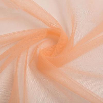 China Hot sale 100% polyester mesh fabric for wedding dress and bed net à venda