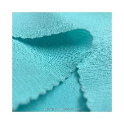 中国 Manufacturer direct 75D polyester fashionable chiffon crepe high quality fabric for dress 販売のため