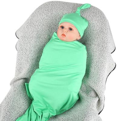 China Wholesale Customized Sleeping Baby Anti-static Solid Color Wrap Blankets Baby Wrap Wrap And Hat Set for sale