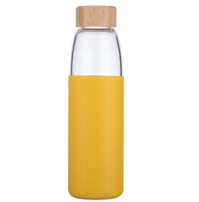 China New Design Borosilicate Glass Sustainable Bottle With Protective Silicone And Bamboo Sleeve Lid for sale