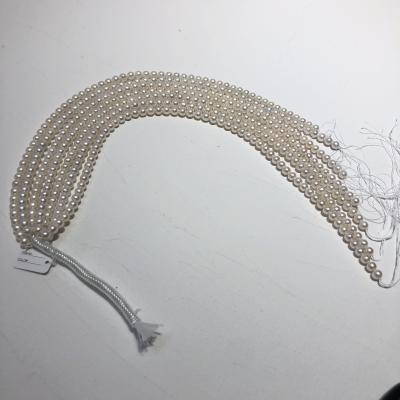 China The freshwater pearl freshwater string ak pearl chain chandelier is basically round and slightly flawed quality luster 7-8mm mother chain for gift for sale