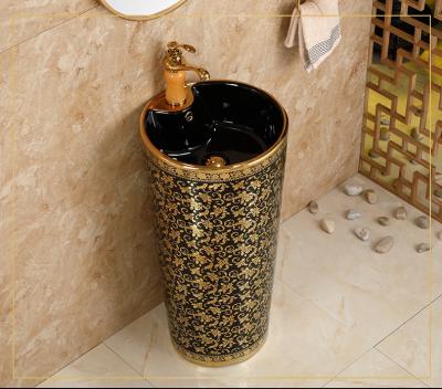 China New Modern Style Gold Ceramic Pedestal Floor Standing One Piece Basin For Bathroom for sale