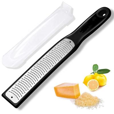 China Good Quality Viable Amazon Stainless Steel Lemon Zester Kitchen Accessories Tools Cheese Grater With Plastic Handle for sale