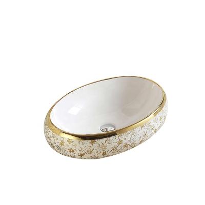 China Modern Countertop Bathroom Sink Resin Gold Artificial Oval Hand Wash Basin for sale