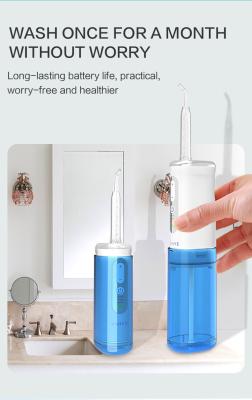 China Hot Sale 150ml OEM Car V-WHITE Portable Dental Water Flosser White/Blue Water Flosser With Combo Toothbrush for sale