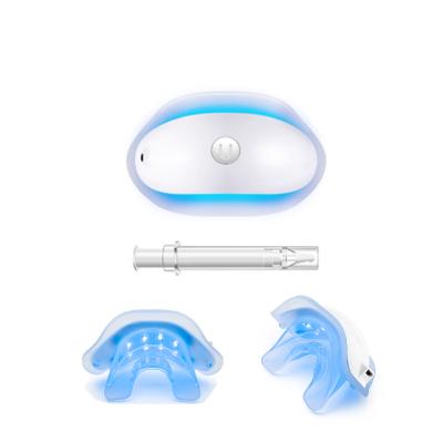 China Daily Home Use Teeth Whitening Kits Private Logo Cordless Teeth Tray Built In 10 Battery Blue Ray Light Teeth Whitening Gel Professional Set for sale