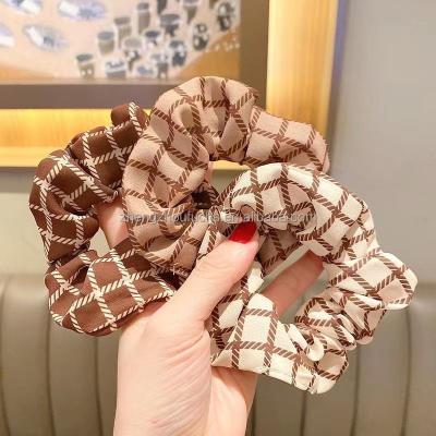 China Sweet Korean version of the main rope net red ponytail hair tie hair ring large intestine cloth hair color tea milk rope for sale