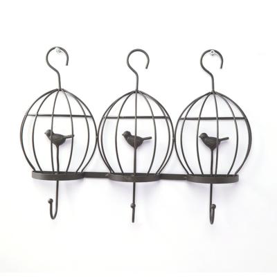 China Metal Clothing Store Creative Bird Cage Wall Mounted Iron Art Clothes Hook for sale