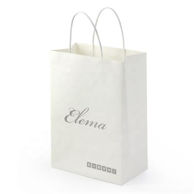 China Recyclable Custom Design Own Logo Craft Gift Bags Cosmetic Paper Packaging Bag Hot Sale Bag for sale