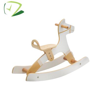 China Exercise Balance Ability Natural Wood Children's Toy Wooden White Rocking Horse For 3 Years Old for sale