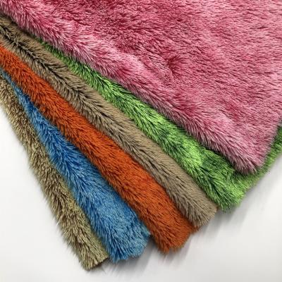 China Anti-Static Custom Made 100% Polyester Peacock Velvet PV Plush Fabric For Making Toys for sale