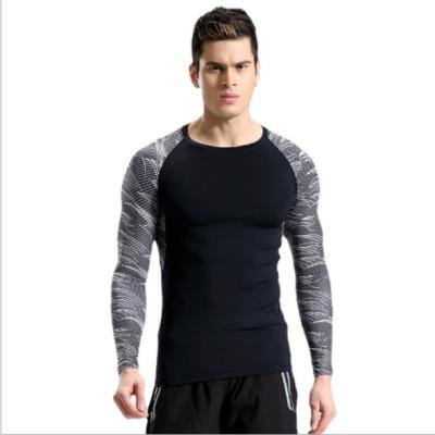 China Custom Anti-Wrinkle Long Sleeve Sports Tops Seamless Quick Dry Mens Gym Tights Fitness Slim Mens Bodybuilding Compression Skins Wear Shirt for sale