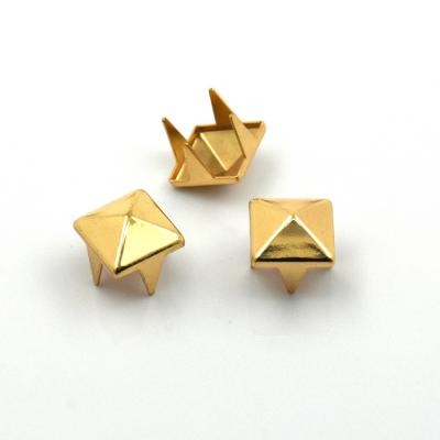 China Factory Price 8mm Eco - Friendly Arc Pyramid Metal Stud With 4 Prongs for sale