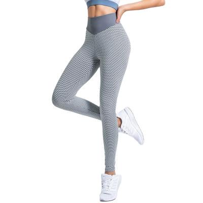 China New Design Women's Gym Fitness Gym Women's Fashion Breathable And Comfortable Soft Honeycomb Yoga Gaiters Skinny Pants for sale