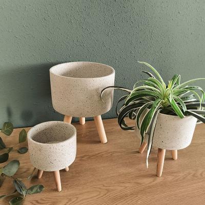 China CLASSIC Garden Cement Pot Planter Flower Pots and Planters with Large Wooden Stand Outdoor Decor for sale