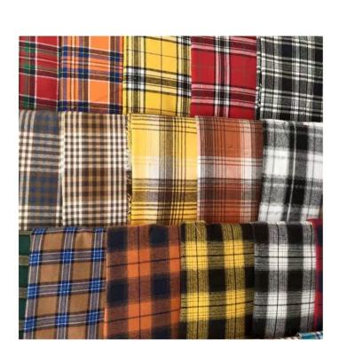 China Keqiao warehouse stock 60%cotton 40%polyester breathable yarn dye brushed fabric check designs CVC yarn dye flannel fabric for shirt for sale