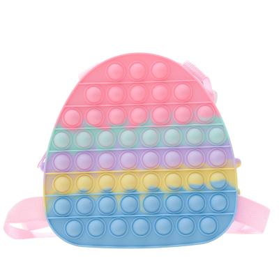 China Kids Viable Shoulder Bag For Girls Jump Up Busy Person Relaxing Toy School Rainbow Backpack Silicone Unicorn Bag for sale