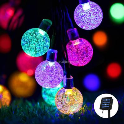 China Solar Christmas Decoration Light 110v/220v 10m Outdoor Waterproof Christmas Tree Decoration Solar Led Ball String Lights for sale