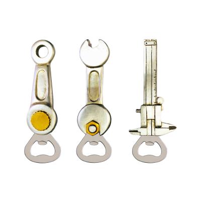 China Viable Industrial Style Handbook Resin Figurines Bottle Opener Creative Painting Magnets for sale