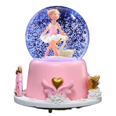 China Wholesale Custom Artificial Ballet Girl Heart Music Box Crystal Ball Eight Sound Snow Resin Ornaments for sale