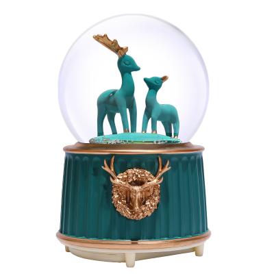 China Custom Wholesale Artificial Crystal Ball Music Box Snow Music Snow Crafts Resin Creative Gifts for sale